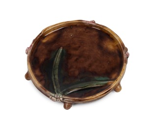 HARVEY SCHOOL pottery platter with applied gumnuts and leaves, incised "M.E. 1932", 23cm wide.