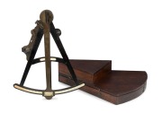 An antique English ebony and ivory nautical ctant in later timber case, 19th century, ​​​​​​​the case 45cm high overall.