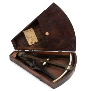 An antique English ebony and ivory nautical ctant in later timber case, 19th century, ​​​​​​​the case 45cm high overall. - 3