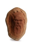 WILLIAM RICKETTS pottery face plaque of an Aboriginal elder, incised "Ricketts" with additional pencil inscription, 24cm high.