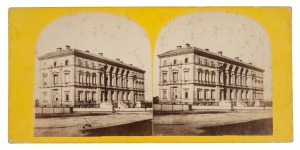 [VICTORIAN INTEREST] Stereoscopic albumen print photograph pair, each image 74 x 72mm (arch-top format), on pale yellow board 82 x 172mm; verso with printed label for &lsquo;A. Morris & Co.&rsquo;s Stereoscopic Views of Victoria. The Treasury [in ms.] Melbourne&rsquo;, and