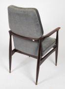 A pair of stained and polished teak armchairs, upholstered in blue velvet, possibly designed by FRED LOWEN for Australian furniture company FLER, mid 20th century, 59cm across the arms. Note: These were executive boardroom chairs from the G.J. Coles head - 5