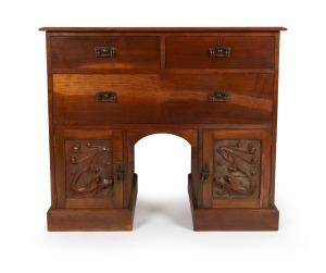 ROBERT PRENZEL Australian blackwood base cabinet with three drawers over two carved panel doors, early 20th century, maker's ink stamp inside the drawer "ROBERT PRENZEL, CITY ROAD SOUTH MELBOURNE", 93cm high, 107cm wide, 56cm deep.