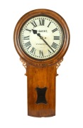 CULGOA RAILWAY STATION rare antique Australian drop dial railway master clock in figured huon pine case, weight driven seconds beating movement with deadbeat escapement and maintaining power. The dial marked "T. GAUNT". Original cast iron bezel, painted d
