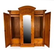An antique Australian huon pine three door breakfront wardrobe with bevelled mirror plate central door, arched pediment and full-length carved and fluted columns, circa 1870, ​​​​​​​234cm high, 220cm wide, 73cm deep. - 2