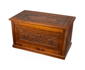An antique Australian Arts & Crafts blackwood blanket box, carved with gumnuts and leaves, early 20th century, 42cm high, 46cm wide, 41cm deep.