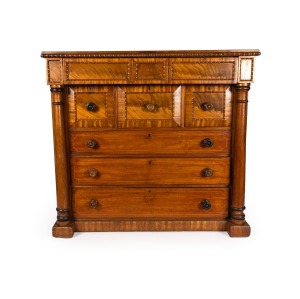 A Colonial Australian cedar chest of seven drawers with cantilever top, full turned columns, blackwood turned mouldings and ebonized highlights, Tasmania origin, circa 1850, 115cm high, 127cm wide, 67cm deep.
