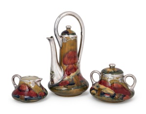 MOORCROFT "Claremont" stunning three piece tea service on rare celadon and tan ground with Art Nouveau sterling silver overlay made for SHREVE & CO. of San Francisco, the teapot signed "W. Moorcroft, Shreve & Company, San Francisco", sugar basin and jug b