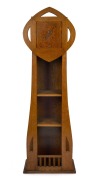 An Arts & Crafts English oak long case clock with eight day time and bell strike spring driven American movement, 19th/20th century, ​​​​​​​191cm high.