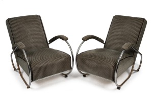 A pair of Bauhaus style chrome framed armchairs, mid 20th century, 80cm high, 67cm across the arms, 100cm deep.
