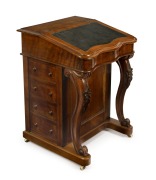 An antique Australian davenport constructed in cyprus pine, interior fitted with compartments and drawers. Four drawers to the side with Wellington style locking system, cantilever top on carved cabriole supports, circa 1870, 83cm high, 61cm wide, 60cm de