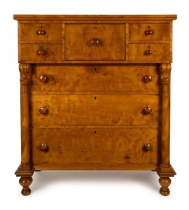 A Colonial huon pine eight drawer cantilever chest with full turned columns and carved corbels, huon pine secondary timbers, Tasmanian origin, circa 1840s, 137cm high, 122cm wide, 58cm deep.