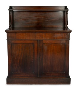 An antique Colonial Australian cedar chiffonier, single shelf back supported on turned columns, full length drawer and two door cupboard to the base, Tasmanian origin, circa 1850, 130cm high, 106cm wide, 45cm deep.