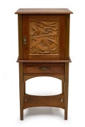 TREEDE & PRENZEL (attributed) antique Australian Arts & Crafts freestanding smoker's cabinet, constructed from silky oak, eucalypt and blackwood, cupboard with fitted interior, single drawer to the front and lower shelf, cabinet door with Gothic stylised 