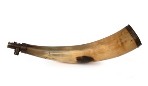 An antique French powder horn with metal fittings, most likely for cannon priming, stamped "Brevete", early 19th century, ​​​​​​​43cm long.