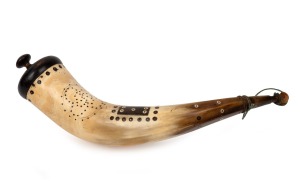 An antique powder horn inlaid with horn and mother of pearl with turned timber ends, most likely French, early 19th century, 37cm long.