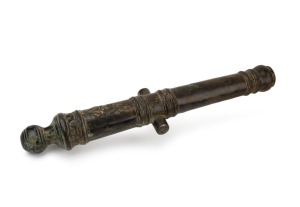 V.O.C. (Dutch East India Company) antique bronze signal or poop deck cannon, early to mid 18th century, cast with the company initials "V.O.C." and the letter "A" for the Amsterdam foundry, 47cm long.
