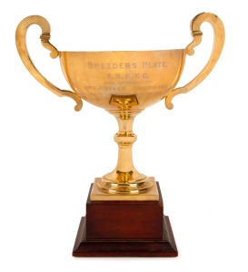 A MAGNIFICENT SOLID GOLD HORSE RACING TROPHY - "BREEDER'S PLATE", S.R.P.T.C., DENILIQUIN, December 1951. A superb classical-style two handled cup in 18ct yellow gold (758gm), awarded to Mrs. A.J. Webb's "BUCKULANA", ridden by jockey K. McMahon, as engraved to the front of the cup. The rear of the cup carries details of other wins from the same stable, between 1928 and 1950. The unusual name of the horse, Buckulana, is based on the local Aboriginal tribe's word for "my lovely one".