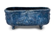 JOHN CAMPBELL pottery flower trough with bird decoration in rare blue drip glaze, incised "John Campbell, Tas.", 19cm high, 44cm wide.