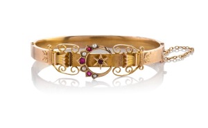 WILLIS & SONS of Melbourne antique 9ct gold bangle, set with seed pearls and red stones, 19th century, stamped "9" flanked by pictorial marks, 6.5cm wide, internal 5.8cm wide, 8.4 grams.
