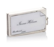 An antique sterling silver vesta with enamel calling card top "JAMES HOLMES, BATHURST, N.S.W.", circa 1902, 7cm wide overall, 53 grams.