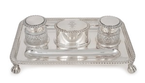 Queen Victoria royal presentation sterling silver inkstand, rectangular tray with gadrooned border, central stamp box with royal inscription "From VRI 1899", flanked by two inkpots in cut crystal with silver lids; gifted to The Rt Hon Lord Hallam Tennyson