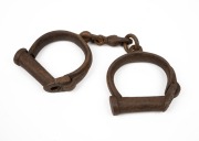 Antique handcuffs, (no key), 19th century, ​​​​​​​24cm wide.