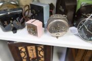 Thirteen assorted vintage wind-up and electric clocks in bakelite and nickel cases, 20th century, the largest 17cm high. - 3