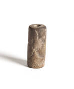 ANTIQUITIES: Neo-Elamite (Persian) hard stone cylinder seal, with a very finely engraved scene of a rider on horseback spearing a stag. 800-600 BC. Length 2.9 cm. (Copy of attribution by British Museum available). - 2