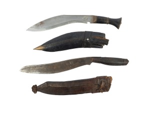 Two antique Himalayan Gurkha knives with leather scabbards, the larger 41cm long.