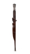 BEN HALL, CANOWINDRA AND WILLIAM ROBINSON: An Aboriginal carved whip handle featuring a lizard and a snake, with an ornate metal finial with &ldquo;BEN HALL 1860&rdquo; scratched into the metal; 54.5cm long overall.