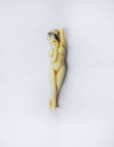 Chinese carved ivory nude reclining figure. Doctor pocket piece. Late Ching. 4cm