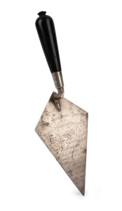 A silver and ebonized timber presentation trowel by Mappin & Webb, engraved from the "Royal Agricultural Society of New South Wales to the Hon. John Kidd M.L.A. Minister of Mines & Agriculture. On the occasion of his placing the corner stone of the Wine K