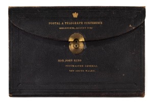 A leather folio made for Sands & McDougall, Melbourne, embossed in gilt lettering "POSTAL & TELEGRAPH CONFERENCE : MELBOURNE, AUGUST 1892 - HON. JOHN KIDD, POSTMASTER GENERAL NEW SOUTH WALES", 31 x 46cm closed.