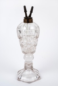 An antique pressed glass whale oil lamp with twin burner metal fittings, 19th century, 28cm high overall.