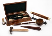 Whalebone handled hammer, jarrah fid, coconut ladle (with blackwood, baleen and whale tooth fittings), carving set with whale tooth handles, whale tooth desk ornament, whalebone handled fid with Turkoman knot sheath and a vintage blackwood and pine roller