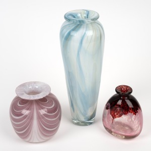 Three Australian art glass vases with engraved signatures, ​​​​​​​the largest 21.5cm high.