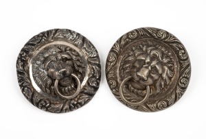 A pair of Colonial British Officer's pouch belt boss's, standard pattern with lion's head device, 19th century, 5.2cm diameter.