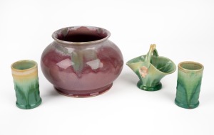 REMUED pink glazed pottery vase together with three REMUED green glazed pottery vases, (4 items), the pink example 12.5cm high, 17cm wide.