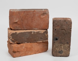 CONVICT BRICKS, four examples with broad arrow marks and thumb prints, from the LAUNCESTON GAOL in Tasmania, circa 1827. These bricks were salvaged when the old gaol was demolished in 1972 and sadly most of the bricks went into rubble and landfill.