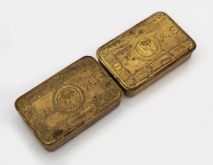 Two WW1 Christmas 1914 gift tins, paid for by the Soldiers and Sailors Christmas Fund organised by Princess Mary and given to troops on the front lines.