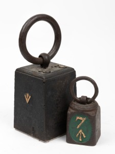 An antique 28lb weight stamped with broad arrow and crown mark, together with a 7lb weight with broad arrow mark, 19th century, (2 items).