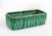 MELROSE WARE green glazed pottery trough with gun leaf decoration, stamped "Melrose Ware, Australian", 8cm high, 24.5cm wide.