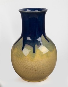 P.P.P. (PREMIER POTTERY, PRESTON) yellow pottery vase with blue drip glaze, 21.5cm high.