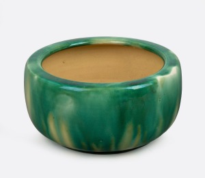 McHUGH pottery bowl with mottled green glaze, incised "H. McHugh, Tasmania", 10cm high, 21cm diameter.
