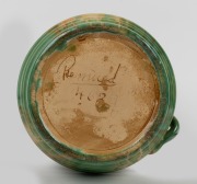 REMUED ribbed green glazed pottery vase with applied branch handle (rare shape), incised signature "Remued, 463", 38cm high. - 2