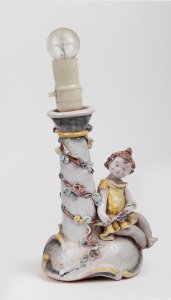 A vintage figural pottery table lamp base, signed "K. H. B.", 30cm high including fitting.