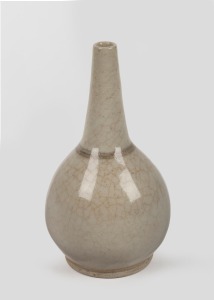 HAROLD HUGHAN pottery stem vase with linear decoration to the shoulder, signed "Hughan", 17cm high.