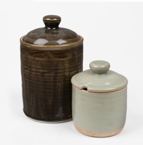 HAROLD HUGHAN two pottery lidded jars, both signed "Hughan", the larger 17cm high.