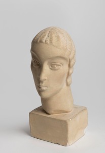 GUSTAV PILLIG fired plaster bust in the Art Deco style, incised "G. Pillig", 21cm high.